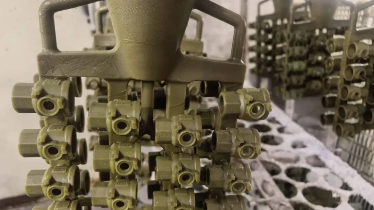 Wax patterns of stainless steel ball valve bodies mounted on a sprue tree for investment castingWax patterns of stainless steel ball valve bodies mounted on a sprue tree for investment casting
